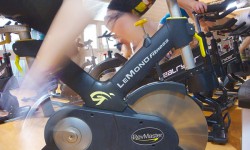 Triathletes cycle while campus sleeps
