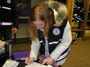 Foot Patrol volunteer Page Boudry signs out at the end of her shift   Photo by Andrea Smith