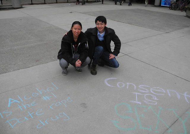 Jessica Tong and Alex Lu volunteer for I Know Someone at Western University.