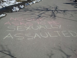 Volunteers of I Know Someone leave messages behind in Victoria Park after a Safe-Patrick's Day campaign. Photo by Andrea Smith.