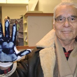 A Canadian man displays his oil-covered glove used in the Dirty Hand Campaign against Chevron.
<br /> Photo courtesy of the Committee in Solidarity with the Indigenous People of Ecuador Affected by Chevron <br />