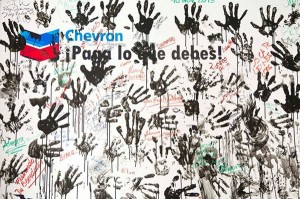 "Chevron: Pay What You Owe" - Poster part of Chevron's Dirty Hand Campaign   Photo courtesy of the Committee in Solidarity with the Indigenous People of Ecuador Affected by Chevron  