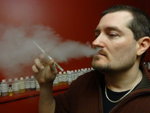 Craig Smith smoking an e-cigarette