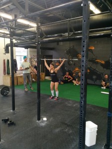 Jenn Lymburner lifts a 55-pound barbell.