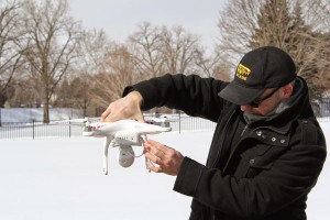 Jeff Owens checks out his drone before takeoff at Harris Park. Photo courtesy of Amy Legate-Wolfe