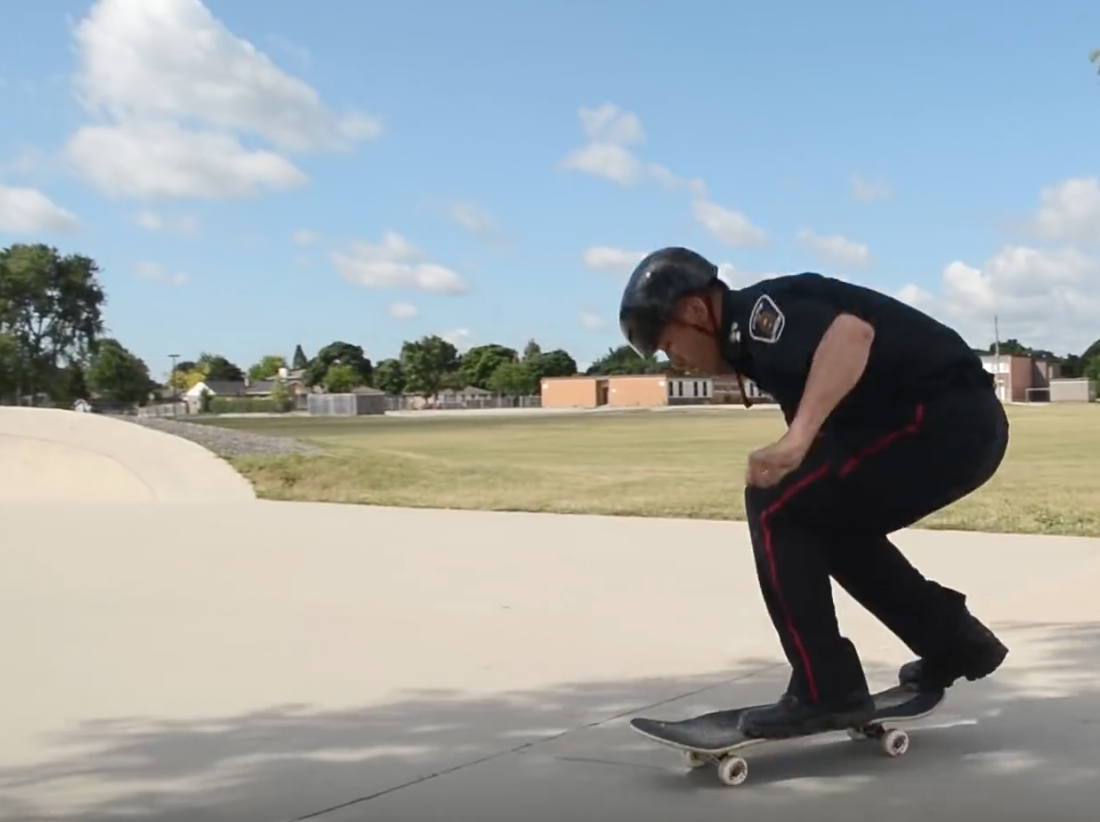 London police officer on a skateboard